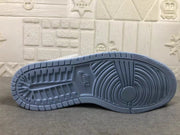 Outsole close-up showing the pale blue rubber traction pattern and molded tread layout.