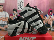 Angled view of black and white Nike sneakers highlighting the layered side construction and translucent-looking heel detail.