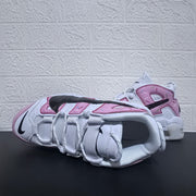 Top view showing laces, padded collar, and pink graphic panels.