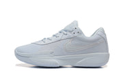 Side profile of a white Nike LeBron Witness basketball shoe with mesh panels and Swoosh detail.