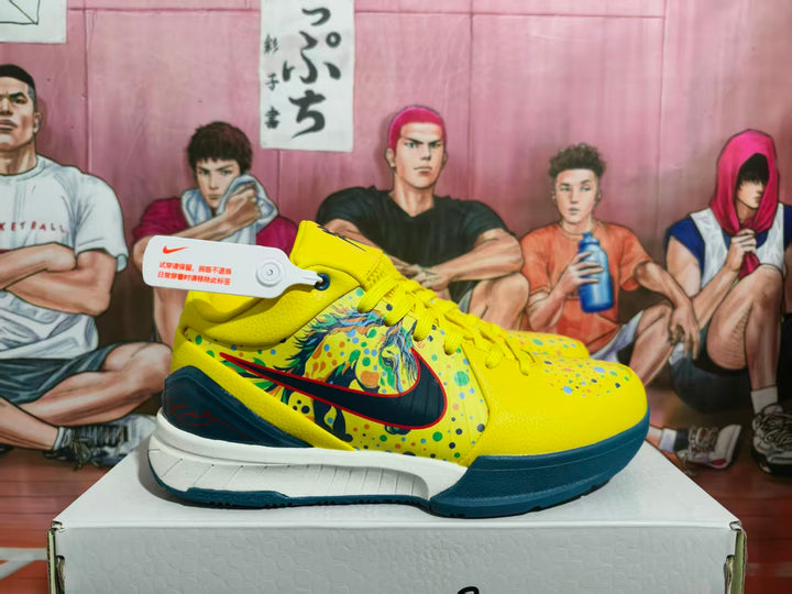 Side view of yellow Nike Kobe basketball sneakers with multicolor dotted detailing, dark blue accents and a visible Nike swoosh.