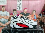 Side profile highlighting the white upper, black trim, red mid-panel accent, and basketball sneaker shape.