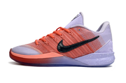 Side profile of the lavender and coral Nike Sabrina 3 shoe