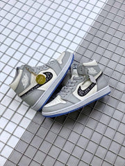 Pair of high-top sneakers photographed together on a metal grid surface.