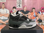 Side profile showing the black and grey upper, mesh panel, molded lace support and speckled midsole.