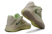 Cream and lime Nike Giannis Immortality 7 shoes, including outsole view