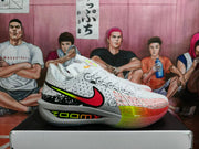 Detailed side profile of the white basketball sneaker with red and neon green accents and a translucent outsole.