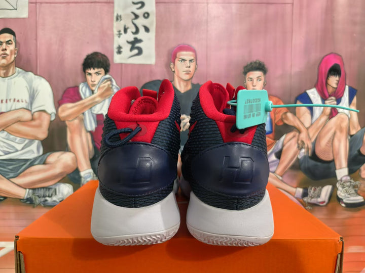 Rear view of navy and red Nike basketball shoes with white soles