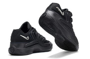 Black Nike KD 18 sneakers showing the heel and outsole.