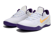 Pair of white Kobe 8 sneakers with gold swooshes, purple collars, and purple outsoles.