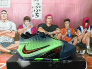 Side view of a navy and bright green Nike low-top basketball shoe with a dark metallic-look Swoosh.