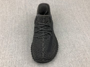 Top view showing the black laces, tongue, and knit-look toe area.
