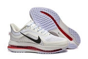 Nike Pegasus Premium shoes shown from the side and outsole, highlighting the red cushioning unit and tread.