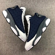 Pair of Air Jordan 13 Flint sneakers viewed from above.