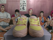 Front view of multicolor Nike Sabrina 2 shoes with yellow laces and contrasting toe panels; size 12 is visible.