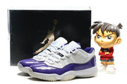 Front three-quarter view of the purple and white sneaker pair with white laces and purple trim.