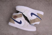 Pair of mid-top sneakers displayed from opposing side angles, showing the color blocking and white soles.