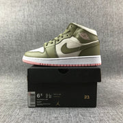 Side view of the sneaker displayed on a black box with a visible size label.