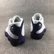 Rear view of the pair showing purple heel panels and circular heel details