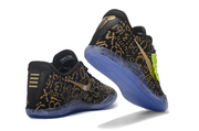 Black and gold patterned Kobe 11 shoes shown from the heel and outsole