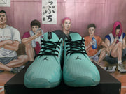 Front view of green Jordan basketball sneakers with black laces, textured uppers, and Jumpman logos on the tongues.