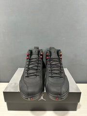 Front view of the pair showing black laces, padded tongues, and red lace hardware.