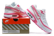 White and pink Nike Air Max BW-style sneakers displayed beside a shoebox; the box label shows a sample size of 6.5.