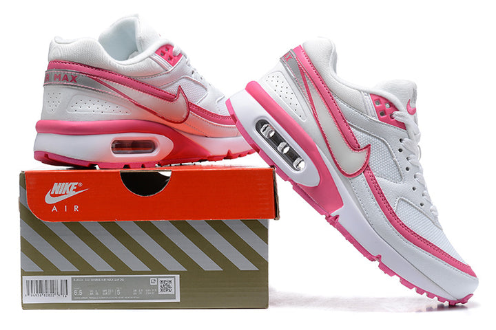 White and pink Nike Air Max BW-style sneakers displayed beside a shoebox; the box label shows a sample size of 6.5.