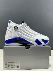 Side view of the sneaker with the box label visible; the label shows Air Jordan 14 Retro, style code 487471 104, EU 42, US 8.5, UK 7.5, and CM 26.5.