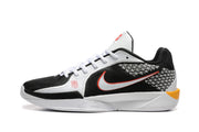 Side profile showing the patterned panel, side logo, and orange heel detail