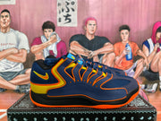 Side view of a navy Nike basketball sneaker with yellow and orange details