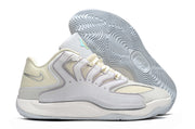 White and silver Nike KD 18 sneaker with a patterned outsole visible.