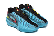 Three-quarter view of the pair highlighting black tongues, black laces, blue molded side panels, and red swooshes.
