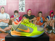 Side profile highlighting the olive-gray upper, orange accents, neon green panels, and translucent outsole.