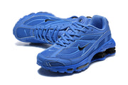 Pair of blue Nike Shox Ride 2 sneakers shown from above and at an angle.
