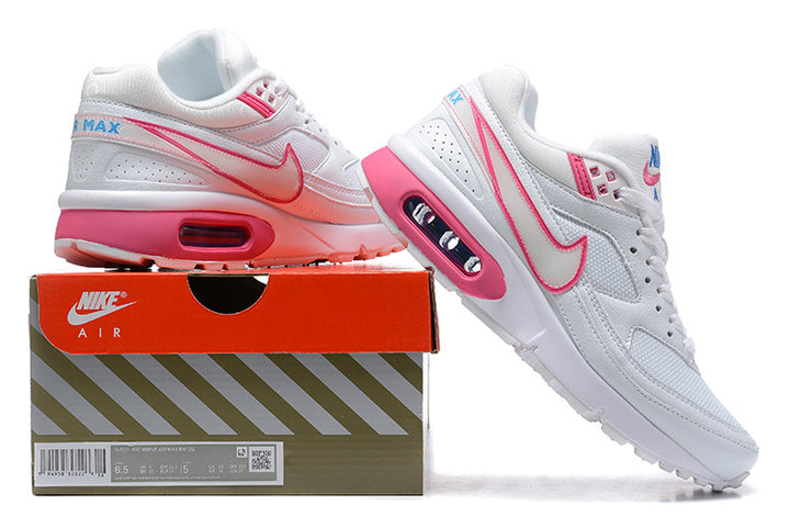 White and pink Nike Air Max BW sneakers displayed on a shoebox; the box label appears to show a sample size.