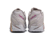 Rear view of the gray shoes with pink heel lettering and patterned soles
