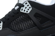 Close-up of the black mesh side panel and white lace wing.