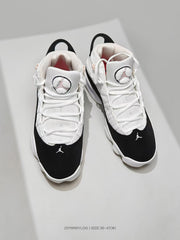 Top view showing the lace-up construction, padded tongues, Jumpman logos, and black toe panels.