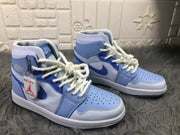Pair of mist blue and white high-top sneakers shown from an angled front view with perforated toe boxes and padded collars.