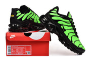Green and black Nike Air Max Plus sneakers displayed with a box label showing size 8 and 9.5.