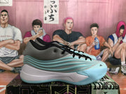 Side view of a blue-gray Adidas basketball sneaker with black laces, aqua side accents, and a pale aqua outsole.