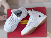 Pair of white high-top basketball shoes shown from above and the side