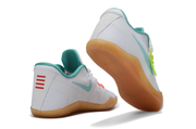 White and teal Kobe 11 shoes with gum-colored soles, shown from the heel and outsole