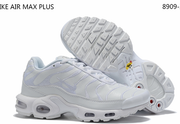 White sneaker shown from the side and underside; image text identifies the Air Max Plus style.