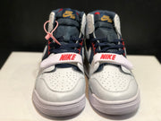 Front view of the pair showing perforated toe boxes, navy laces and adjustable white forefoot straps.