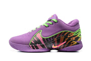Side profile of a purple sneaker with bright green trim, a multicolor patterned side panel, and a Nike swoosh.