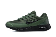 Side view of a green Nike Air Max VERSA sneaker with black Swoosh and sole.