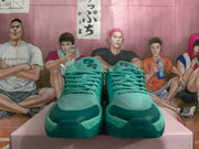 Front view of a pair of mint green lace-up basketball sneakers