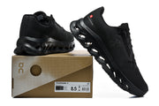 Black On Cloudmonster 3 shoes beside a box whose label shows US 8.5, UK 7.5, and JP 26.5.